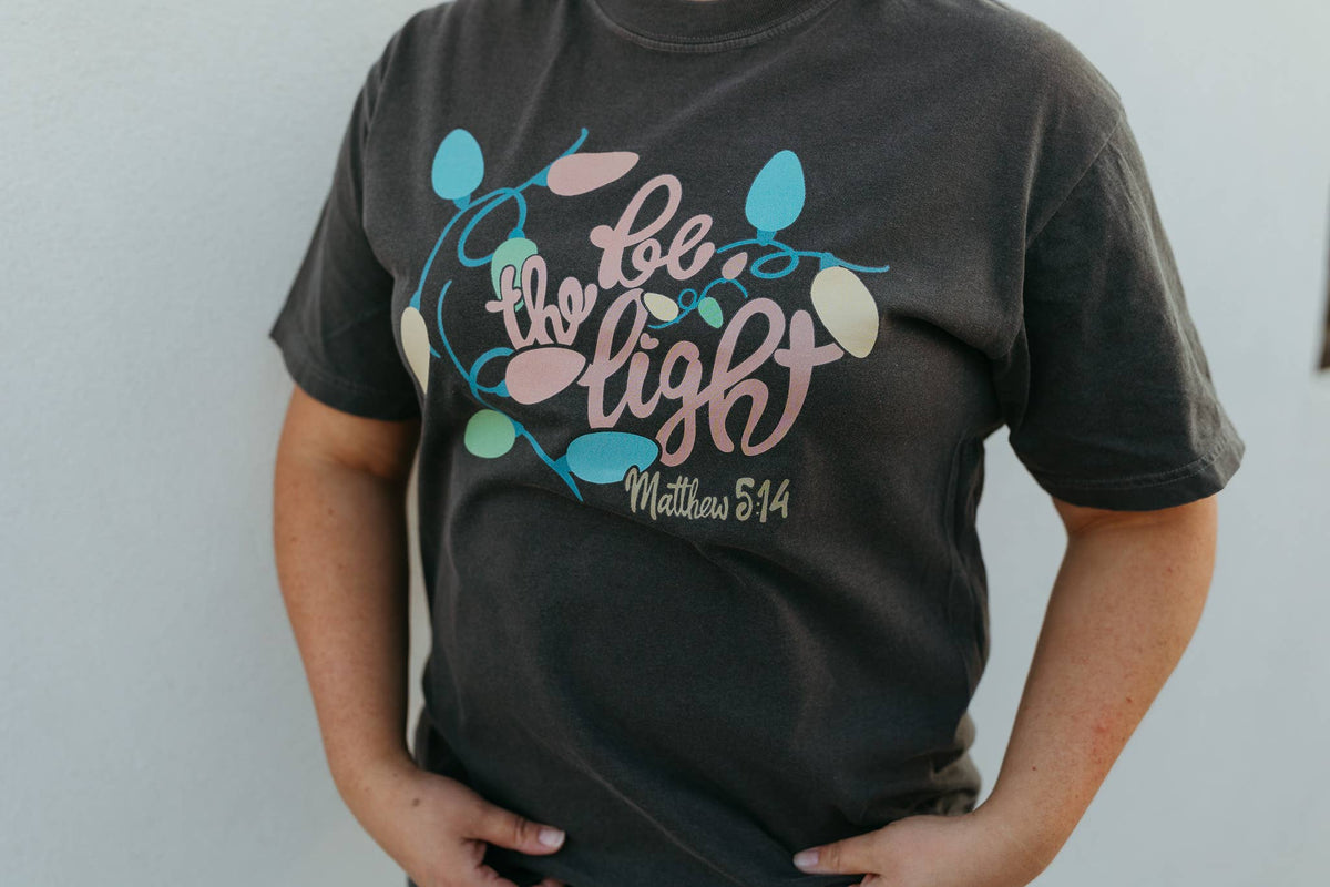 Be The Light Christmas Graphic Tee - Multiple Colors